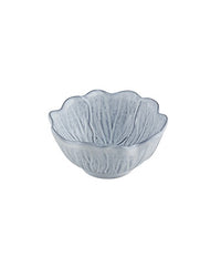 Decorative grey and white bowl with scalloped edge on a white background