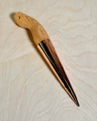 Copper dibber on birch ply background