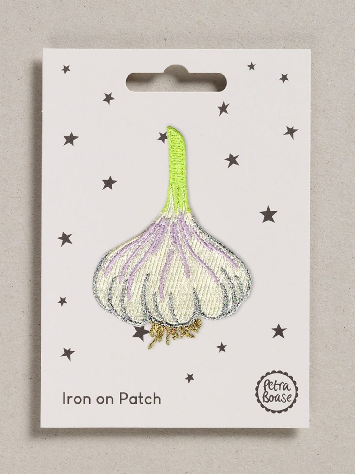 Garlic patch iron on a card with star patterns